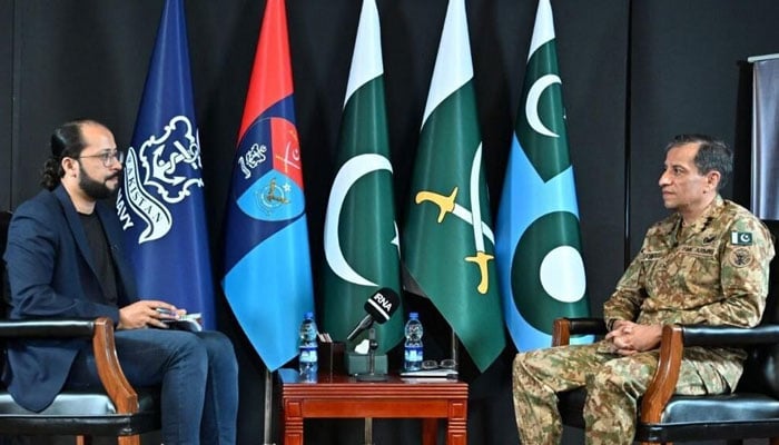 nter-Services Public Relations (ISPR) Director General (DG) Lieutenant General Ahmed Sharif Chaudhry gestures during an interview with IRNA in May 2025. — IRNA